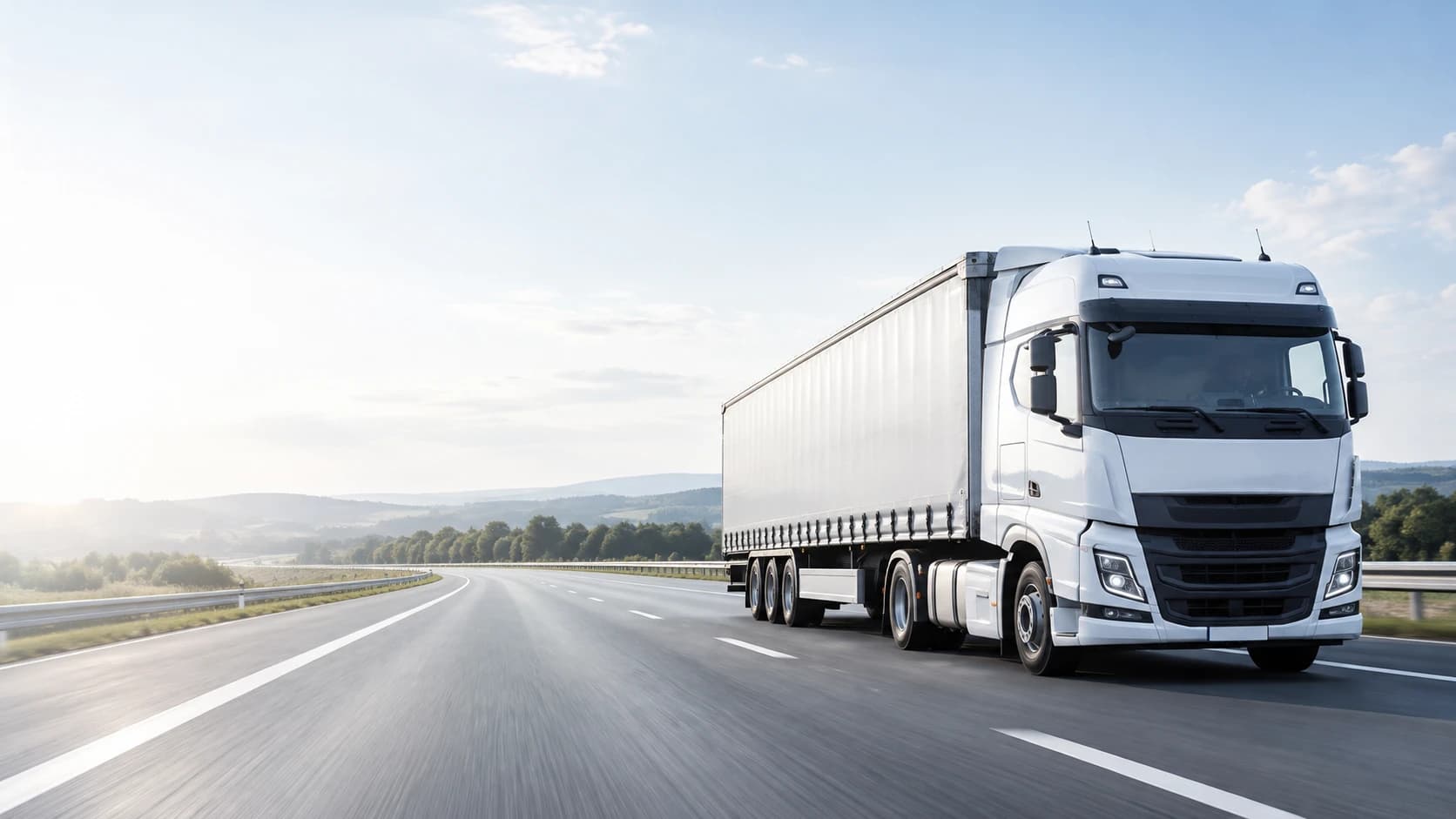 White articulated truck on a European motorway